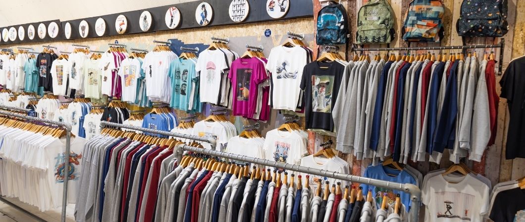 thrift store full of clothes and bags