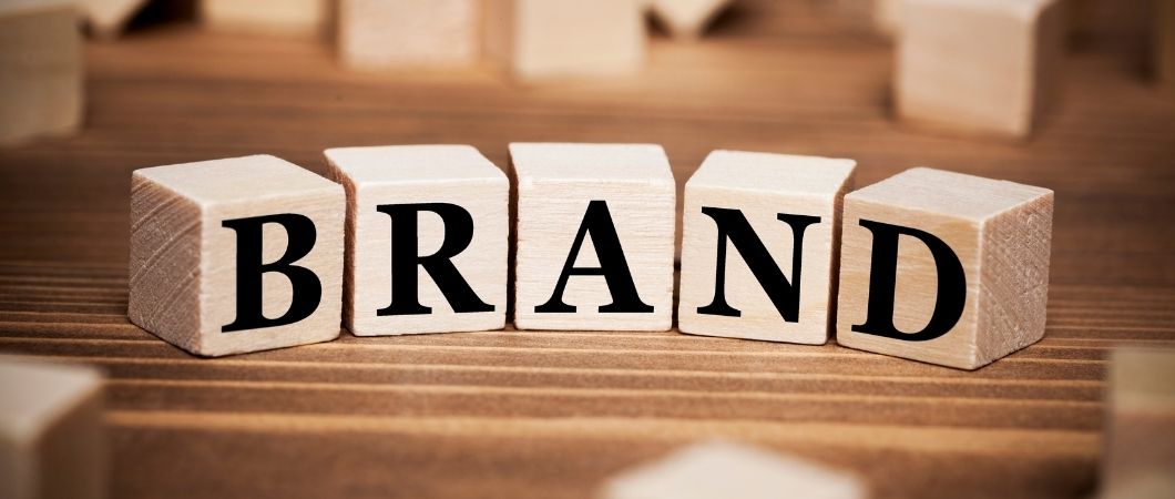 brand letters in a wooden dices