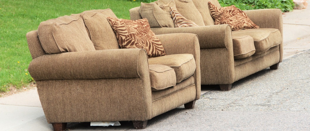 two couches on the street to be donated
