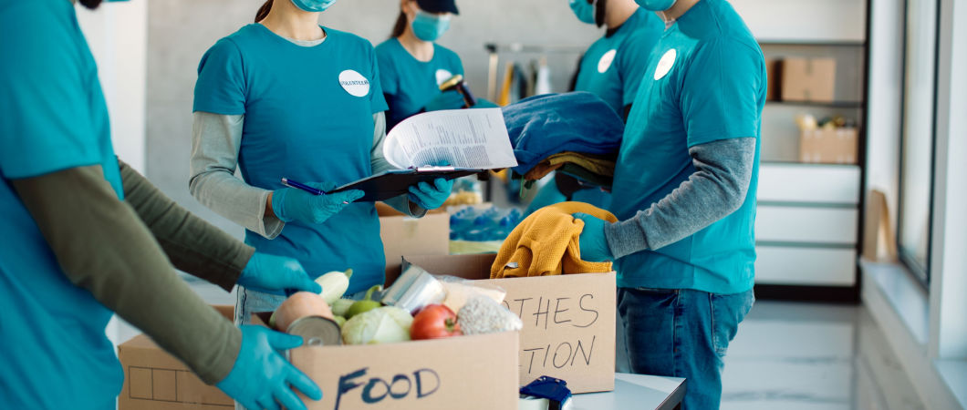 group-of-volunteer-packing-donation-boxes