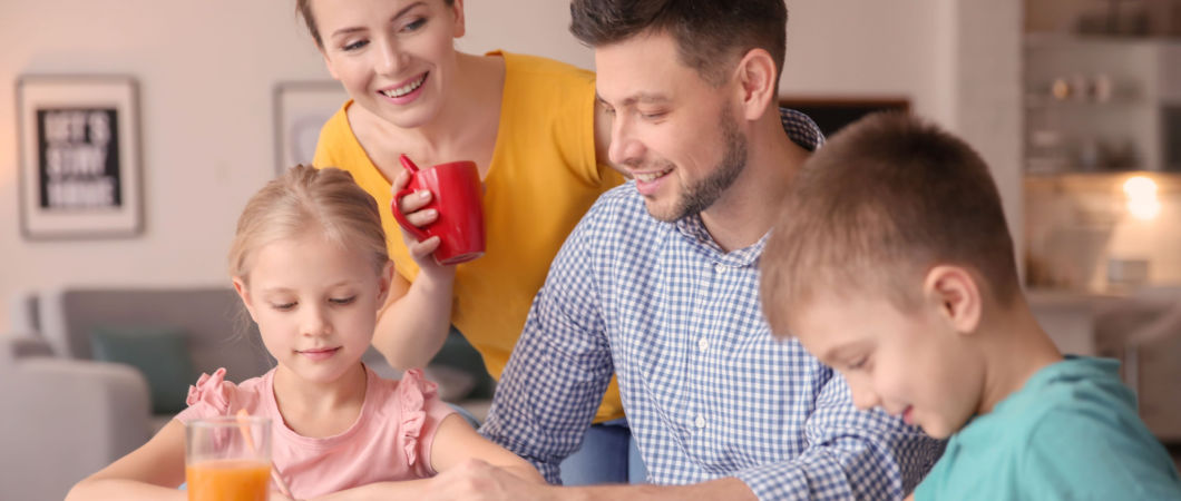 married couple making emergency plan with their children