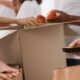 volunteer packing food for veterans charities