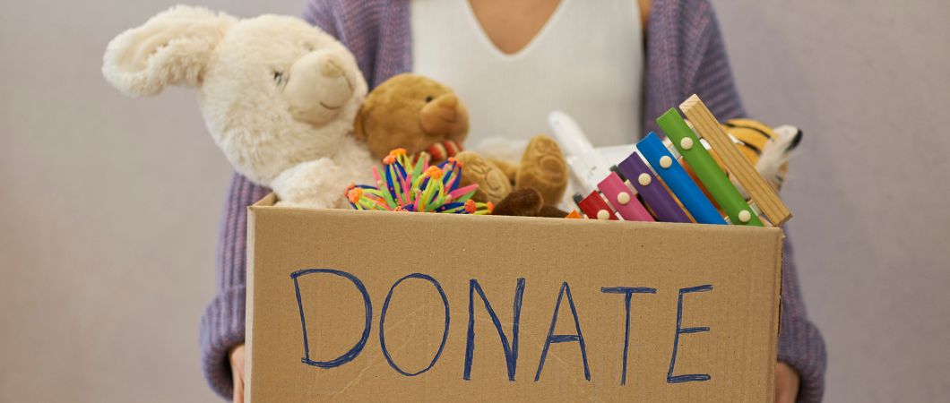 woman collect toys for childrens charity