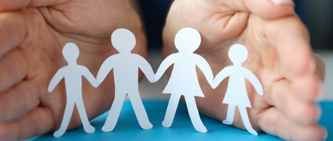 woman hands protect a children from paper