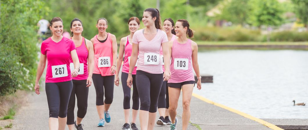 women participate in a 5k race for fundraising event