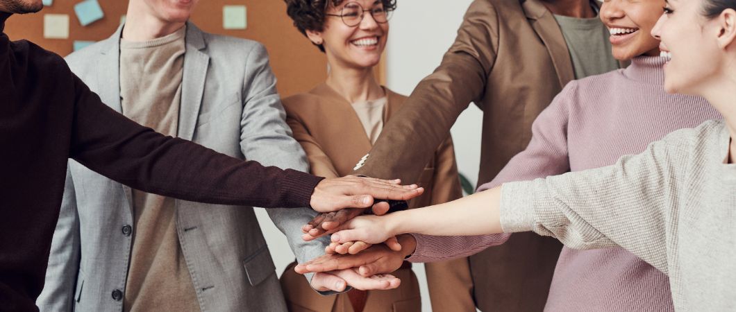 business partners holding each others hands