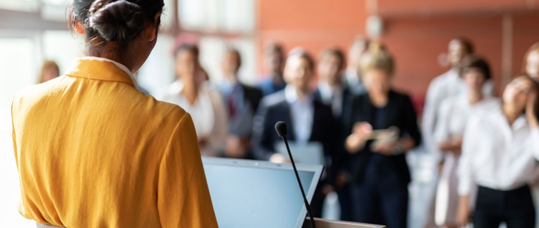 sponsor of charity making speech in public