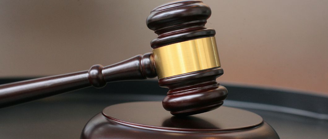 close up of gavel on table
