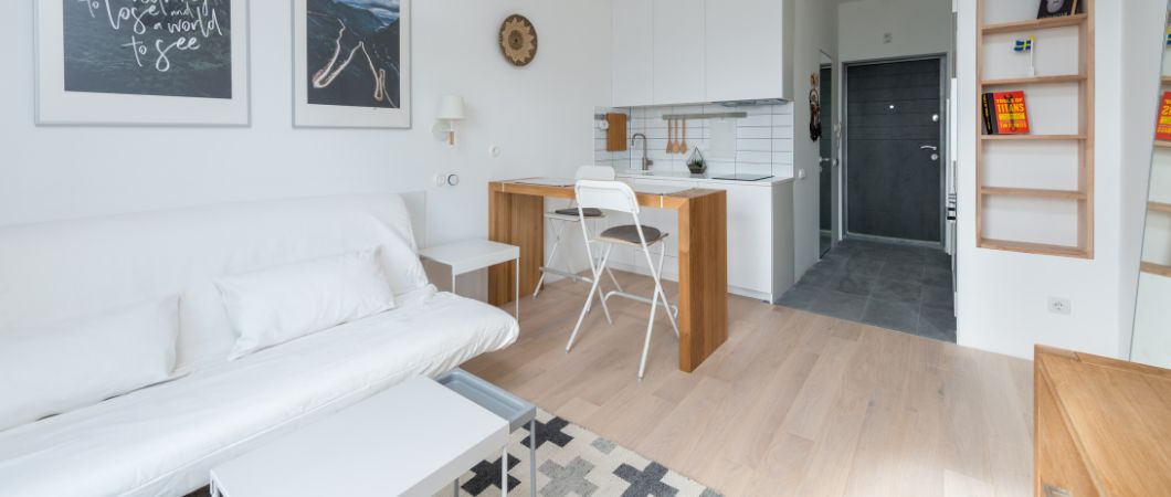 light living room with small kitchen zone