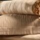 used bedding set on dark background